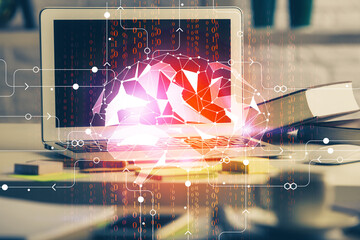 Double exposure of work space with computer and human brain drawing hologram. Brainstorm concept.