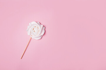 Beautiful tender meringue on a pink background, March 8, mother's day, birthday present, sweets