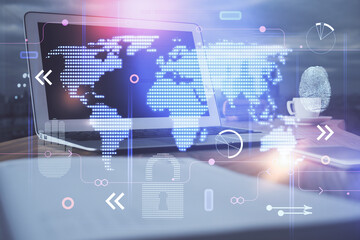 Multi exposure of table with computer and world map hologram. International data network concept.