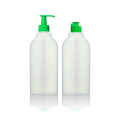 Two white plastic transparent bottles with green caps with reflection isolated on white