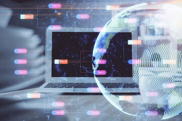 Multi exposure of table with computer and world map hologram. International data network concept.