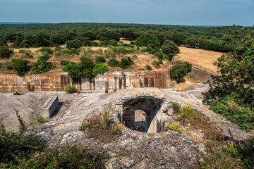 Ruins of Austro-Hungarian Fortification Fort Forno in Istra, Croatia. Beautiful historical fortress made of stone. Abandoned landmark dating back to 1904 covered with vegetation in bad shape