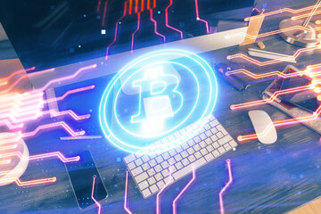 Double exposure of blockchain and crypto economy theme hologram and table with computer background....