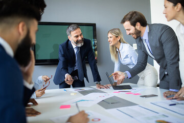Business people working discussing as a team at the office