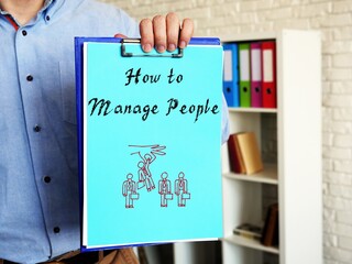 Career concept about How to Manage People with phrase on the page.