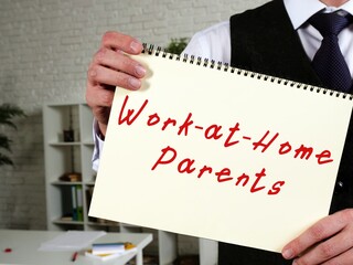 Career concept meaning Work-at-Home Parents with phrase on the sheet.