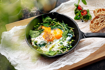 Traditional Tunisian breakfast. Ready dish served in a hot pan. Suggestion of serving the dish. food background