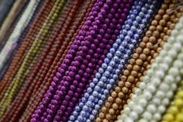 Colorful strings of beads ...