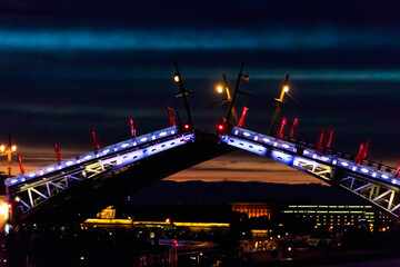 Opening of Palace drawbridge. Night view of Palace bridge from the Neva river in Saint Petersburg, Russia