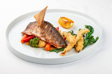Sea bass fillet with steamed vegetables