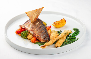 Sea bass fillet with steamed vegetables