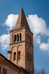 Fototapeta na wymiar Bell tower of the Church of San Gregorio Magno, one of the oldest churches in Ferrara (X century), Emilia-Romagna, Italy, Europe