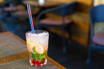 Refreshing mojito with crushed ice on a hot summer day