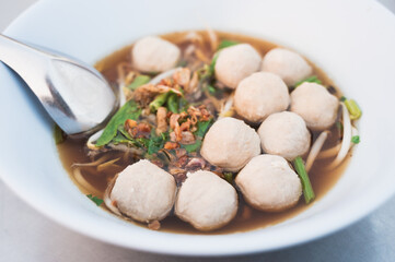 Beef ball soup with bean sprout in a bowl