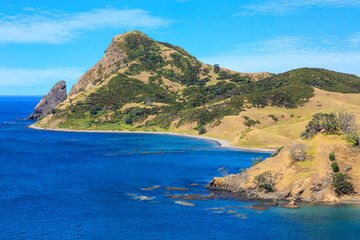 Coastal landscape in the remote far north of the Coromandel Peninsula, New Zealand. Sugar Loaf Hill and the Pinnacles