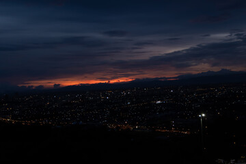 Fototapeta na wymiar Evening city Hat Yai from Khao Kho Hong view Hat Yai, Songkhla. The twilight sky in sunset city top view