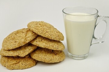 A glass of milk and homemade nut-protein cookies