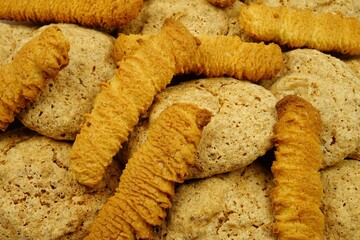 Assorted of cookies including nut cookies and shortbread cookies, background