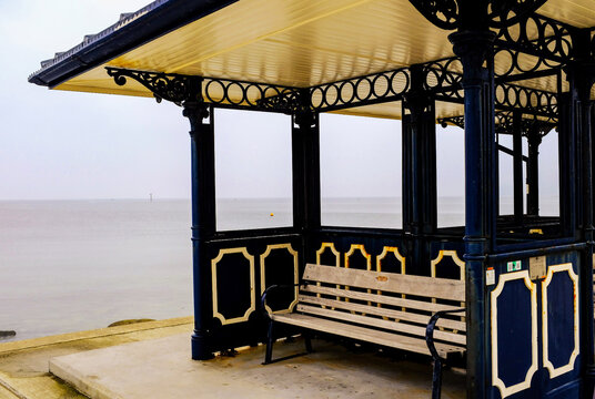 North Wales stock photos: Ornate shelter with seating on the promenade at Deganwy, Conwy, UK. 18th June 2020.