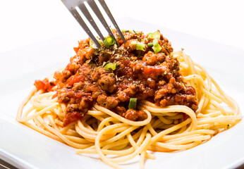 Spaghetti  with potatoes sauce  in pan , in door  Chiangmai  Thailand