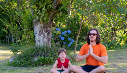 Uncle and nephew meditating and playing in nature.