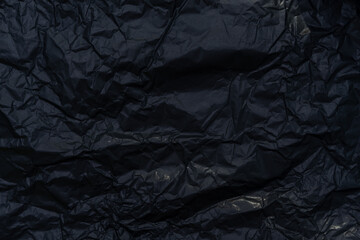 texture of black crumpled paper. abstract background