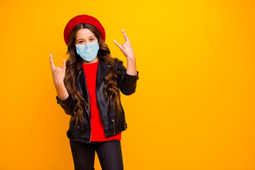 Fototapeta na wymiar Portrait of her she attractive cool naughty healthy long-haired girl wearing safety gauze mask stop mers cov influenza showing horn sign isolated bright vivid shine vibrant yellow color background