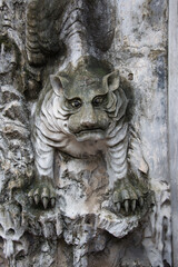 Fototapeta na wymiar Cement sculpture of a tiger. Somewhere in Vietnam.