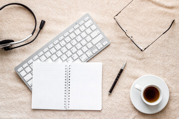 Home office concept. Laptop, notebook on blanket top view