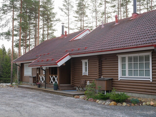 Fototapeta na wymiar Wooden Scandinavian cozy house in Finland