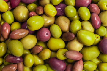 Tasty mix olives background.