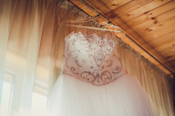 wedding dress hanging