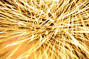 Sparkling fireworks display against the night sky. abstract background for celebration merry christmas, birthdays, Victory Day, independence, holidays, celebration, party, festival, new year concept