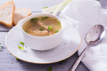 Fresh fish soup with ingredients and spices for cooking. Woodn background