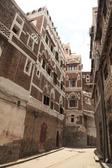 Fototapeta na wymiar Traditional Yemen houses. Sanaa, which is on the Unesco World Heritage list, has many traditional houses. Houses with several floors are built of bricks.