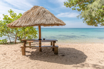 Fototapeta premium Beach Umbrella and Seat, Sunset beach, Koh Rong Samloem island, Sihanoukville, Cambodia.