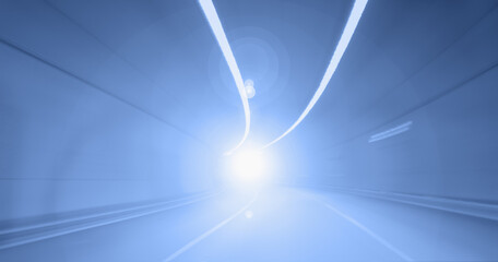 Highway road tunnel with car light 