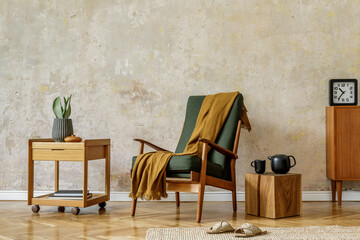 Modern retro composition of living room interior with design armchair, cube, tea pot, plant, clock, commode, plaid, carpet, decoration and elegant presonal accessories in wabi sabi concept.