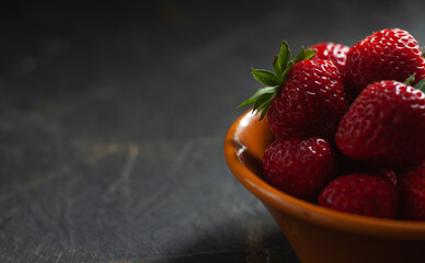 strawberries on a concrete table,
