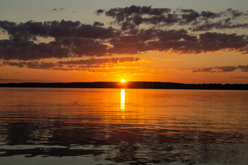 Magical fairytale sunset in the evening on the lake