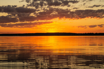 Magical fairytale sunset in the evening on the lake