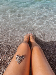 beautiful legs near the sea