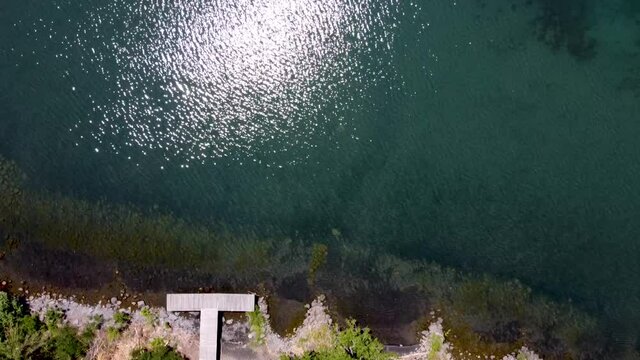 Aerial view of a small pier on Lake Bracciano. Trevignano, Rome