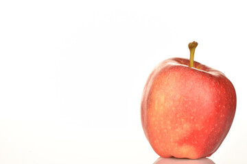 Red ripe apples, close-up, on a white background.