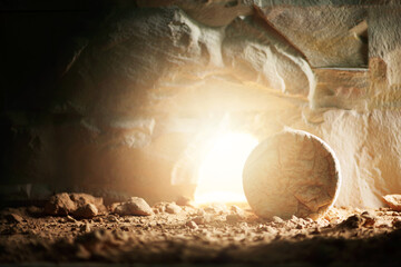 Empty tomb of Jesus Christ with light. Born to Die, Born to Rise. "He is not here he is risen". Savior, Messiah, Redeemer, Gospel. Alive. Christian Easter concept. Jesus Christ resurrection. Miracle