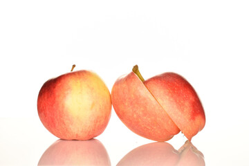 Red ripe apples, close-up, on a white background.