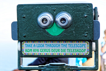 Pay to view telescope at Cape of Good Hope, South Africa, overlooking Cape Point. With Afrikaans...