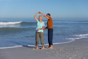 Senior Caucasian couple enjoying time at the beach