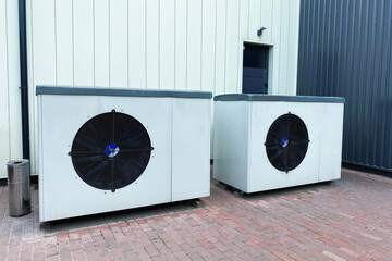 Industrial fan turbine background. Air conditioner condenser fan units battery set climate control....