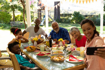 Fototapeta na wymiar Family eating together at table